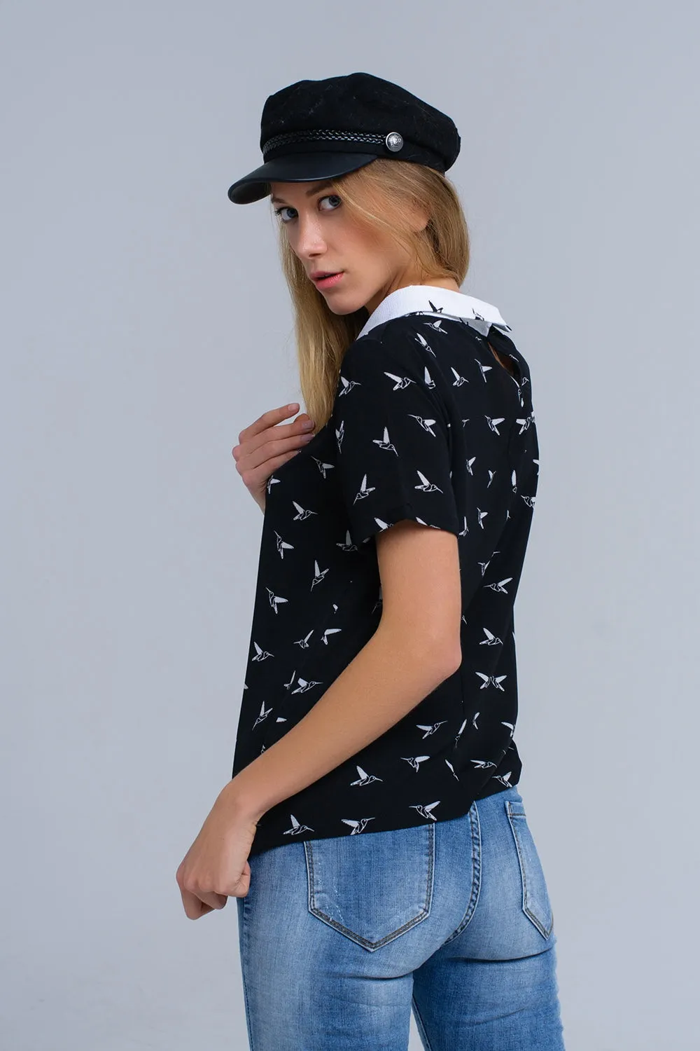 Black shirt with white printed birds